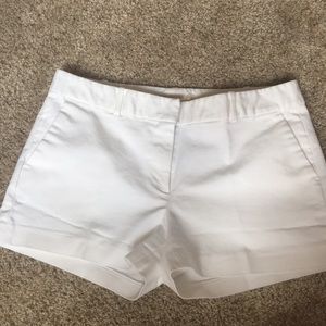 White Michael Kors dress shorts.